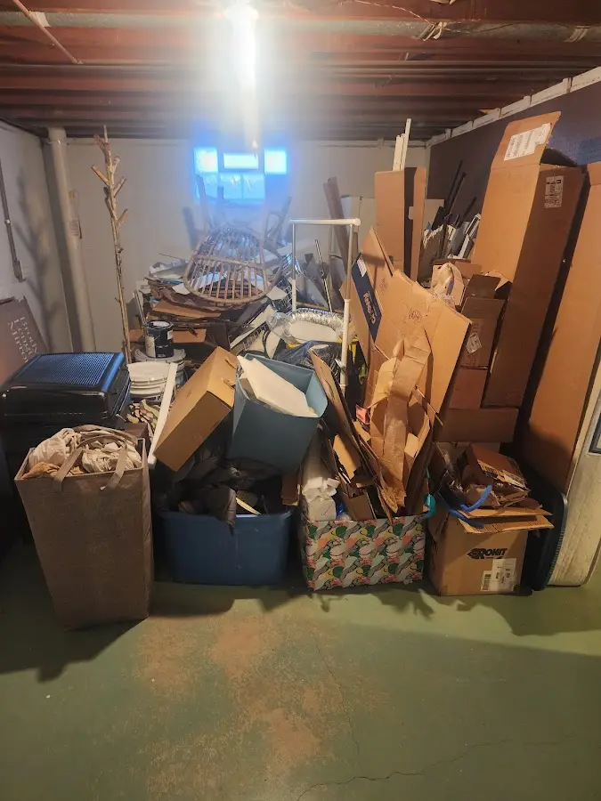 Roll-off dumpster container at job site for 8 Yard Dumpster Rental in Plainville